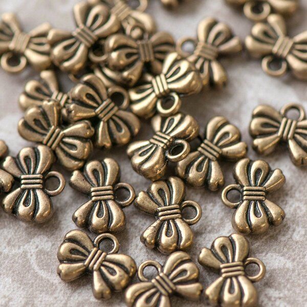 подвеска металлическая "бантик", цвет античная бронза, 12х10х3 мм