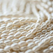 Бусина, имитация жемчуга "Рис", стекло, цвет сливочный, 7х4 мм (уп 30+/-5 шт)