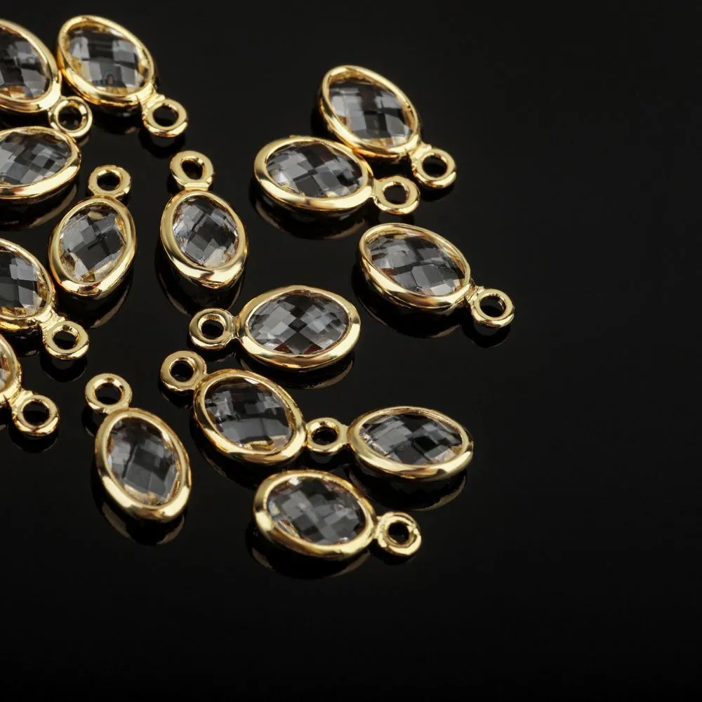 подвеска металл "эллипс", позолота/прозрачный, 9x4.5x2 мм